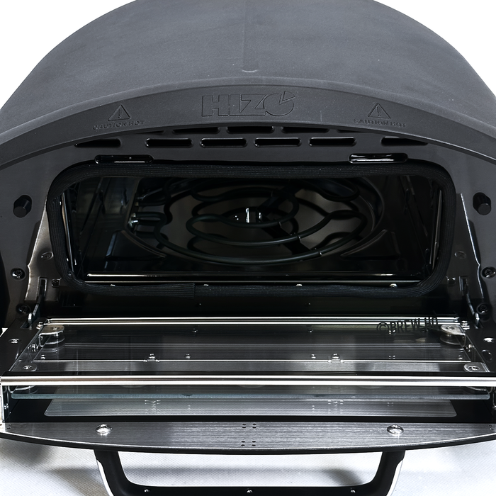 Oven interior with open door showing heating elements and brand logo.