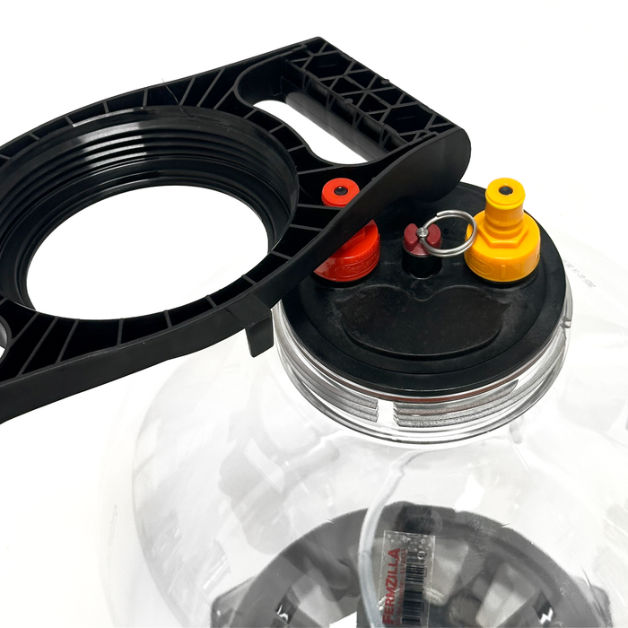 Close up of the fermzilla handle taking the lid off with leverage