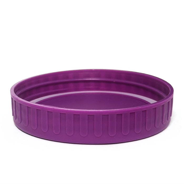 Purple plastic lid on a white background